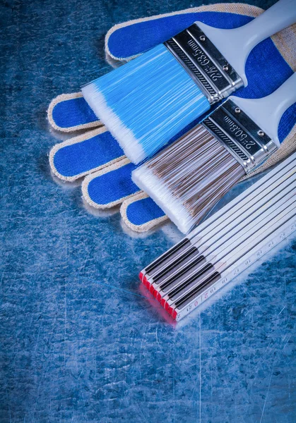 Wooden meter paintbrushes — Stock Photo, Image