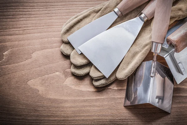 Paint scrapers angle formers gloves — Stock Image Paint scrapers angle formers gloves Stock Photo