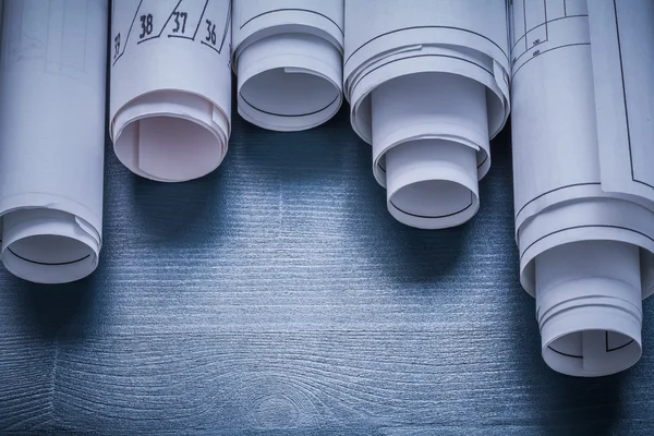 Five blueprints rolled up — Stock Photo, Image