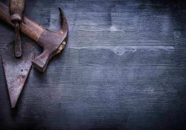 Claw hammer and putty knife clipart