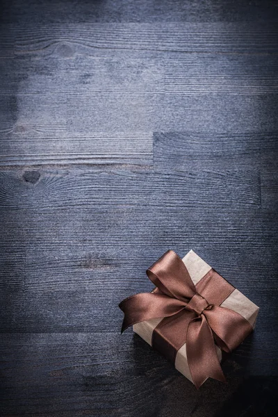 Gift box with brown bow — Stock Photo, Image