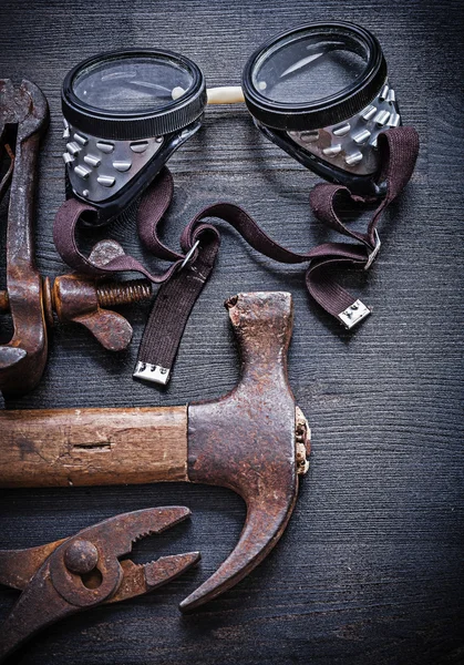 Goggles, hammer and pliers — Stock Photo, Image