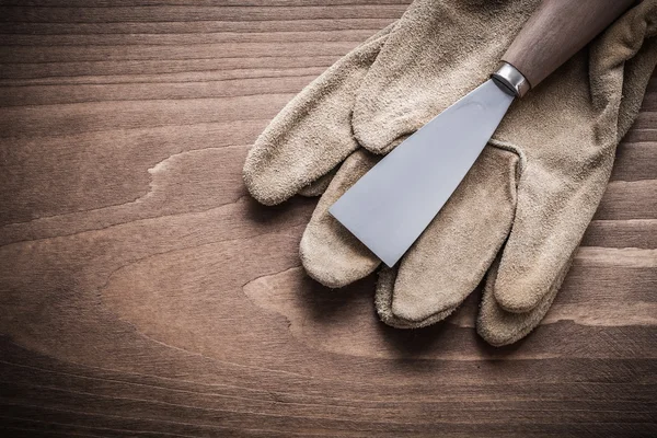 Verf schraper en werkhandschoenen — Stockfoto