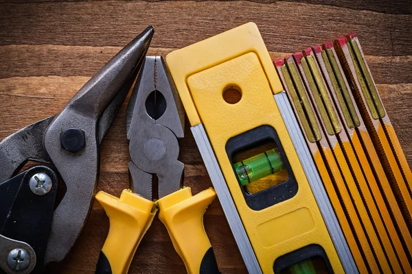 Livello di costruzione e metro di legno — Foto Stock