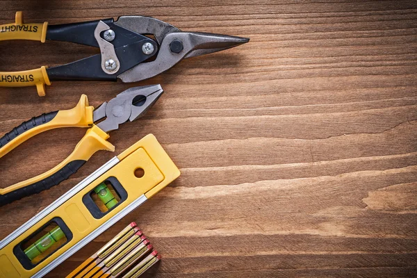 Construction level and wooden meter — Stock Photo, Image