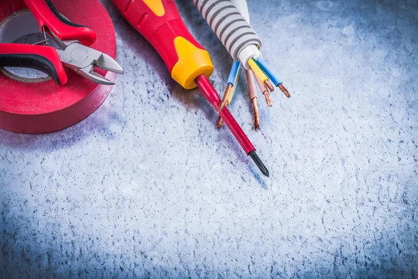 Cutting pliers and insulated screwdriver — Stock Photo, Image