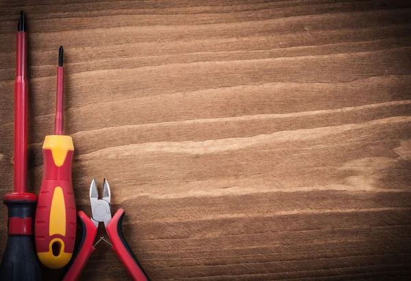 Sharp nippers and insulated screwdrivers — Stock Photo, Image