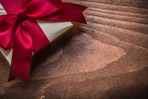 Present box with brown ribbon — Stock Photo, Image