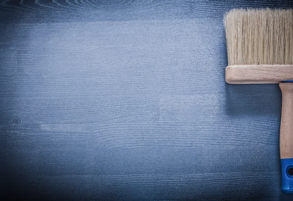 New paintbrush on wood — Stock Photo, Image