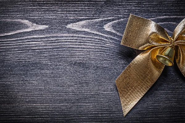 Golden bow with bell — Stock Photo, Image