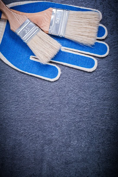 Paintbrushes, protective glove — Stock Photo, Image