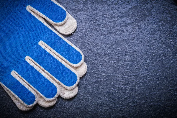 Protective gloves on black — Stock Photo, Image