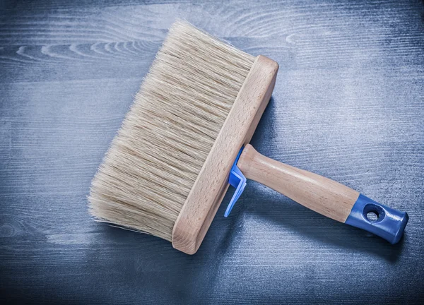 Paint brush on wood — Stock Photo, Image