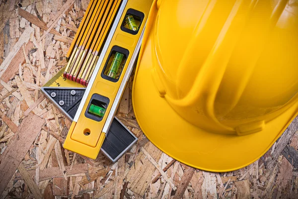 Nivel de construcción, casco, medidor — Foto de Stock