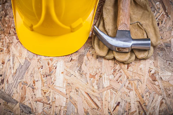 Claw hammer, hard hat and gloves — Stock Photo, Image