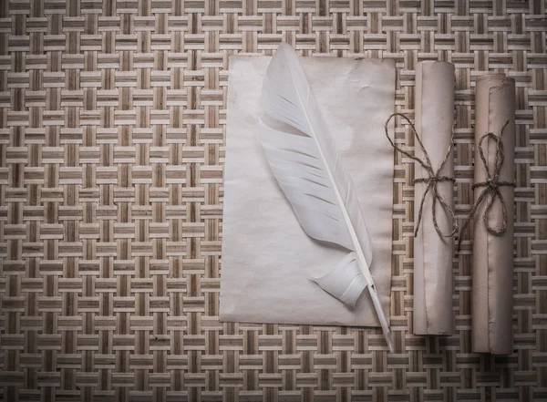 Rolls of vintage paper and quill — Stock Photo, Image