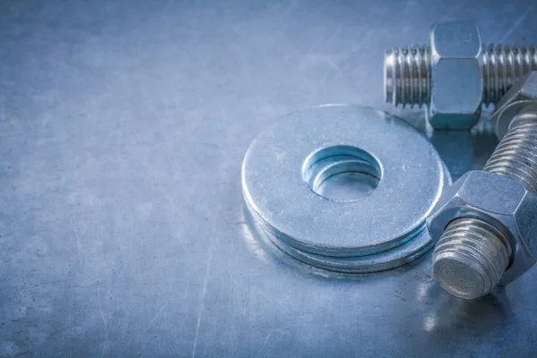 Bolts, washers, screwbolts, construction nuts — Stock Photo, Image