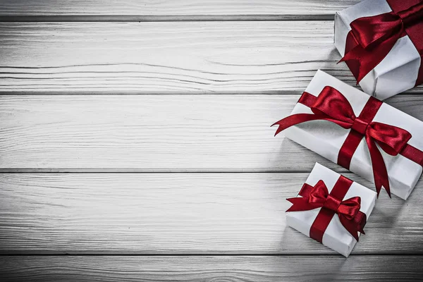 Gift boxes with red bows — Stock Photo, Image