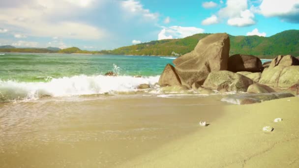Sea surf on the beach with rocks and sand. Thailand. Phuket — Stock Video