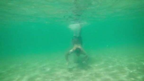 Underwater View of a Tourist. Swimming in the Tropical Sea — Stock Video