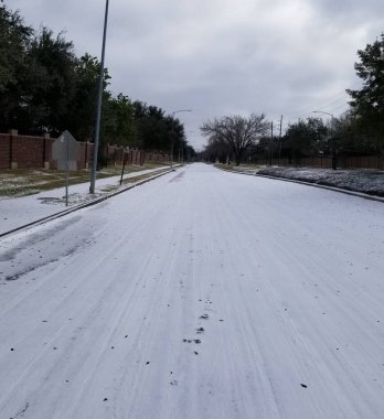 Icy road conditions at Houston Texas  clipart