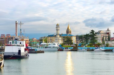 Batumi skyline with reflection in the sea clipart
