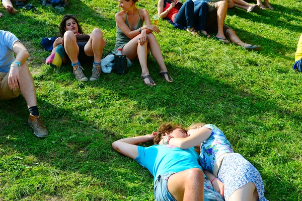 Romantic couple on the grass — Stock Photo, Image