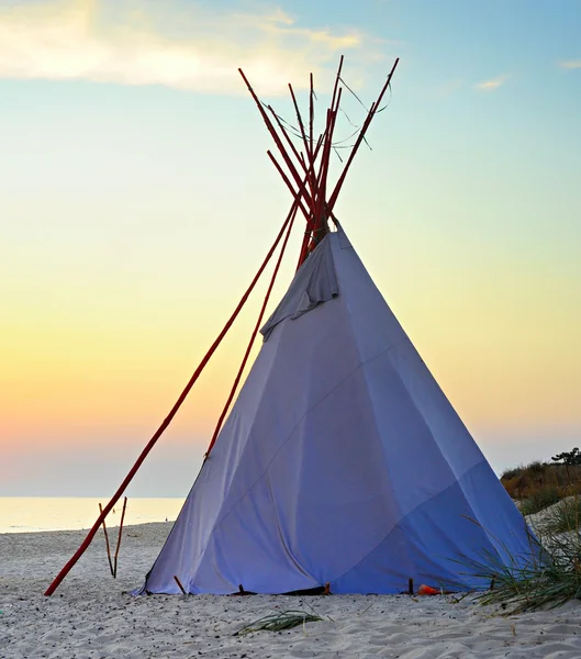 Traditional Teepee on a sea beach — Stock Photo, Image