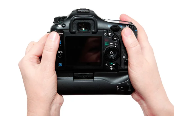 Camera in hand on white — Stock Photo, Image