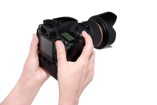 Camera in hand on white — Stock Photo, Image