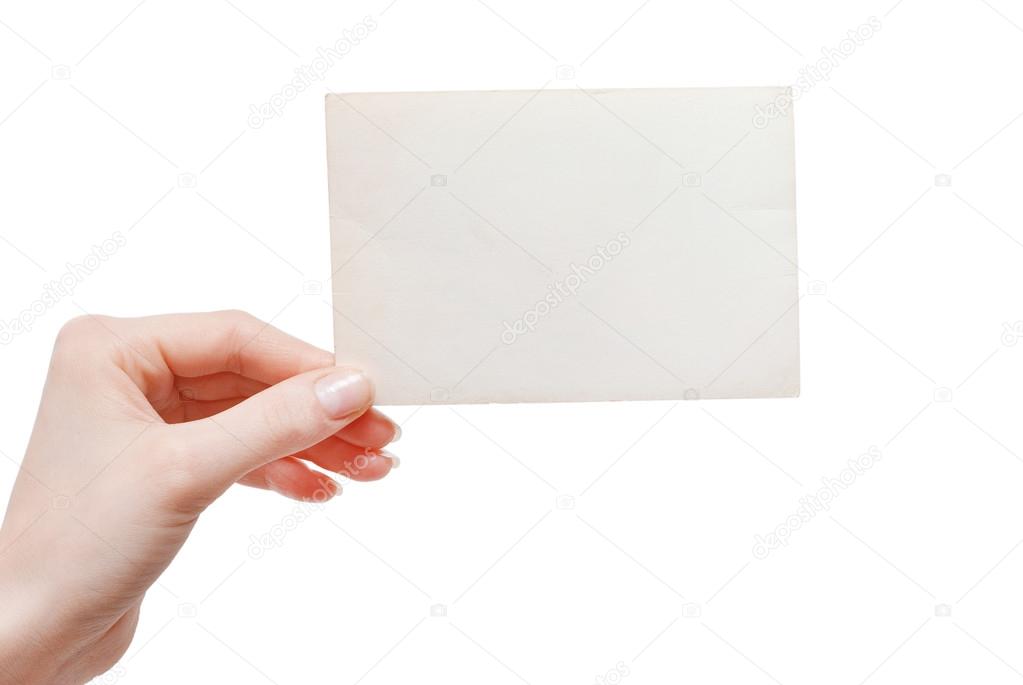 Hand holding blank card