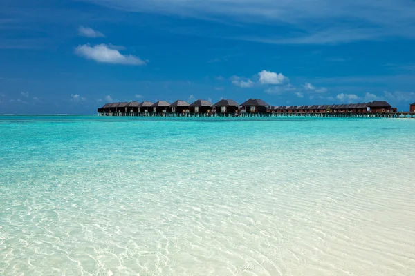 Beach with water bungalows at Maldives — Stock Photo, Image