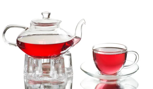 Glass cup of tea and teapot — Stock Photo, Image