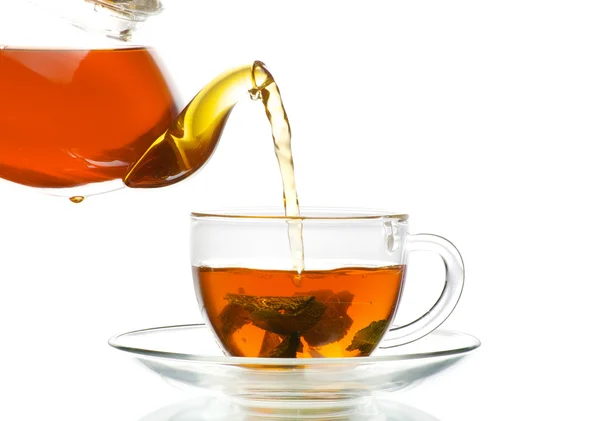 Vetro tazza di tè e teiera — Foto Stock