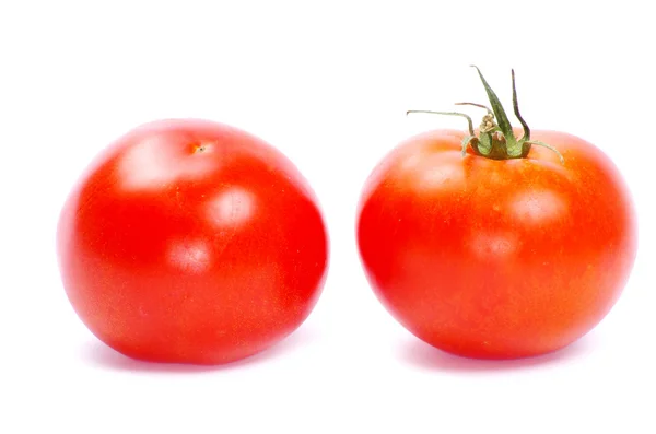 Два красных помидора — стоковое фото