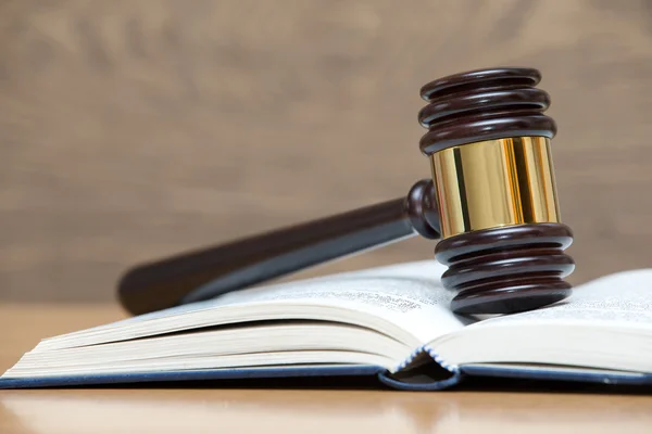 Wooden gavel and book — Stock Photo, Image