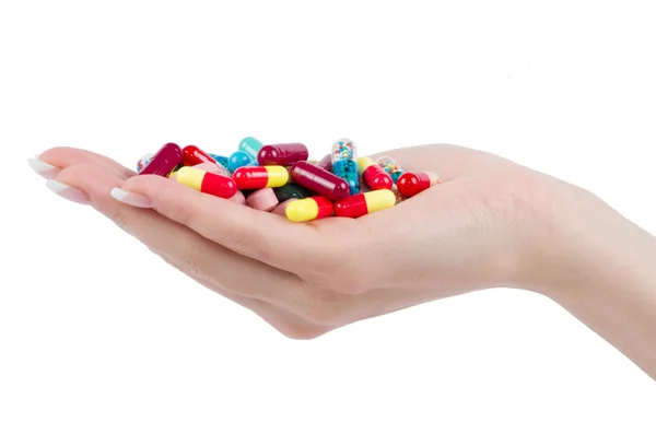 Hand holds pills — Stock Photo, Image