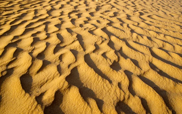 Sand texture in Gold desert — Stock Photo, Image