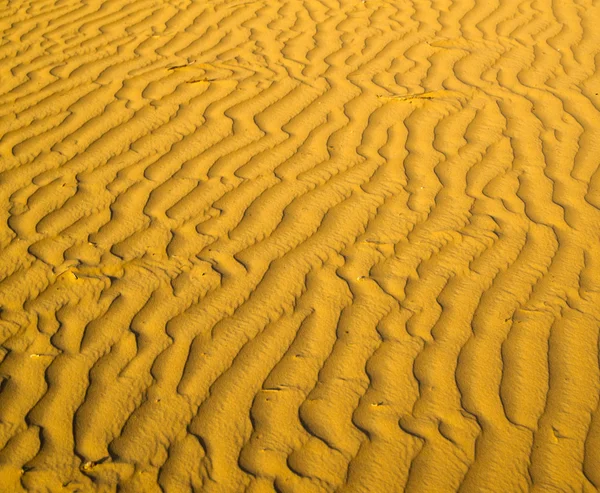 Textura de arena en desierto de oro —  Fotos de Stock