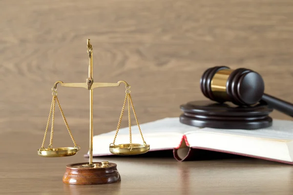 Wooden gavel and book — Stock Photo, Image