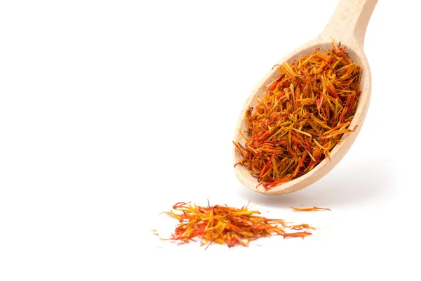 Saffron spice in wooden spoon — Stock Photo, Image