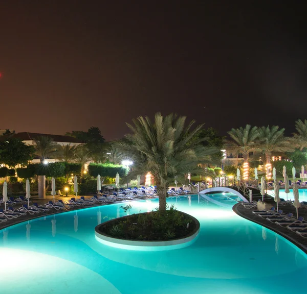 Swimming pool in night illumination — Stock Photo, Image