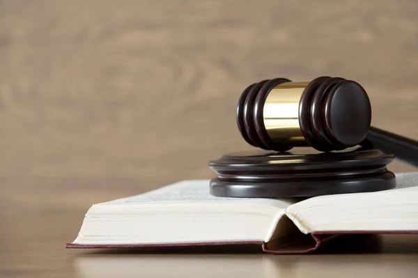 Wooden gavel and book — Stock Photo, Image