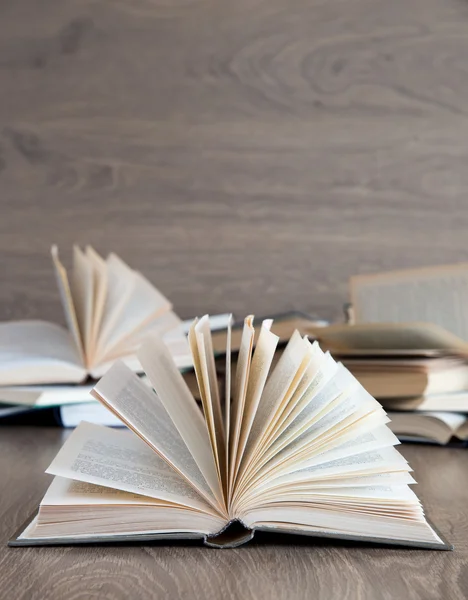 Books on wooden deck — Stock Photo, Image