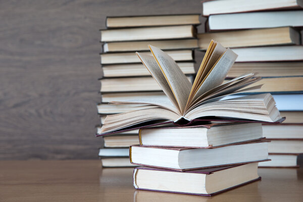 Books on wooden deck