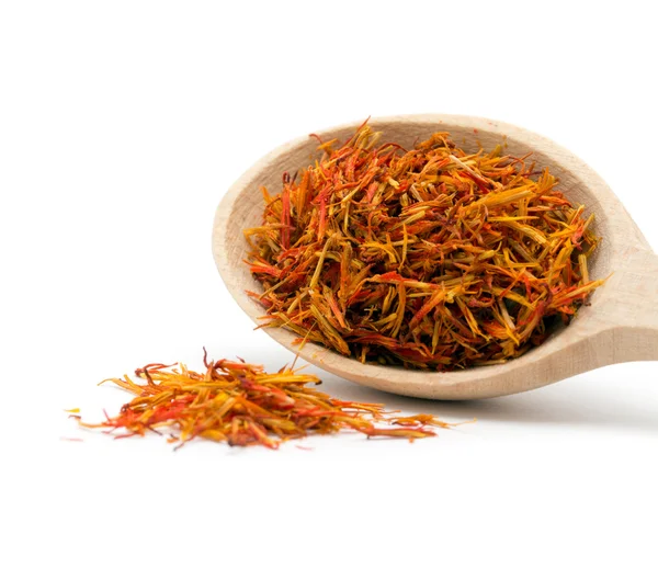 Saffron spice in wooden spoon — Stock Photo, Image