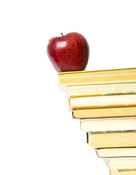 Apfel und Bücherstapel — Stockfoto