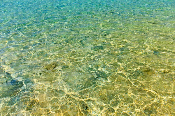 Acqua con riflessi solari — Foto Stock