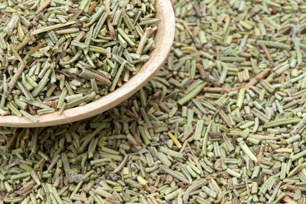 Dried rosemary  in  spoon — Stock Photo, Image