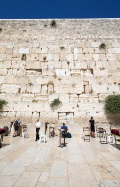 worshipers pray at Wailing Wall , Israel